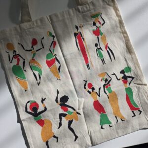 ACAP Made cream tote bag stencilled with dancing figures in red, green, gold and black